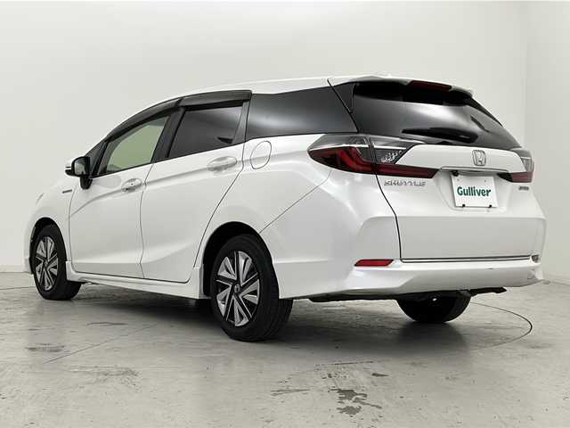 ホンダ シャトル ハイブリッド ホンダセンシング 宮城県 2020(令2)年 7.7万km プラチナホワイトパール 禁煙車/ホンダセンシング/・路外逸脱抑制機能/・衝突軽減ブレーキ/・オートクルーズコントロール/社外7インチナビ/・BT.CD.DVD.USB.SD.AUX/バックカメラ/社外ETC/プッシュスタート/スマートキー/スペアー（1本）/ステアリングスイッチ/ドアバイザー/アイドリングストップ/横滑り防止機能/ヘッドライトレベライザー