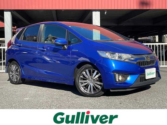 ホンダ フィット ハイブリット Sパッケージ 神奈川県 2015(平27)年 6.5万km ブリリアントスポーティブルーメタリック2トーン 社外SDナビ【NX614】		/・DTV/CD/DVD/ラジオ/SD/BT	/バックカメラ/ETC		/純正16インチAW/ルーフエンドスポイラー/クルーズコントロール/シティブレーキアクティブシステム/パドルシフト付き革巻きステアリング/D席シートリフター/スカッフイルミネーション/オートライト/純正LEDヘッドライト/フォグランプ/Egプッシュスタート/ ストップボタン		/スマートキー×2/ターンランプ付電動格納ドアミラー/純正フロアマット/取扱説明書/ナビ取扱説明書		/新車時保証書