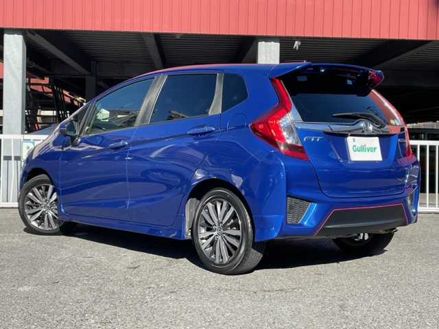 ホンダ フィット ハイブリット Sパッケージ 神奈川県 2015(平27)年 6.5万km ブリリアントスポーティブルーメタリック2トーン 社外SDナビ【NX614】		/・DTV/CD/DVD/ラジオ/SD/BT	/バックカメラ/ETC		/純正16インチAW/ルーフエンドスポイラー/クルーズコントロール/シティブレーキアクティブシステム/パドルシフト付き革巻きステアリング/D席シートリフター/スカッフイルミネーション/オートライト/純正LEDヘッドライト/フォグランプ/Egプッシュスタート/ ストップボタン		/スマートキー×2/ターンランプ付電動格納ドアミラー/純正フロアマット/取扱説明書/ナビ取扱説明書		/新車時保証書