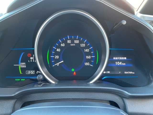 ホンダ フィット ハイブリット Sパッケージ 神奈川県 2015(平27)年 6.5万km ブリリアントスポーティブルーメタリック2トーン 社外SDナビ【NX614】		/・DTV/CD/DVD/ラジオ/SD/BT	/バックカメラ/ETC		/純正16インチAW/ルーフエンドスポイラー/クルーズコントロール/シティブレーキアクティブシステム/パドルシフト付き革巻きステアリング/D席シートリフター/スカッフイルミネーション/オートライト/純正LEDヘッドライト/フォグランプ/Egプッシュスタート/ ストップボタン		/スマートキー×2/ターンランプ付電動格納ドアミラー/純正フロアマット/取扱説明書/ナビ取扱説明書		/新車時保証書