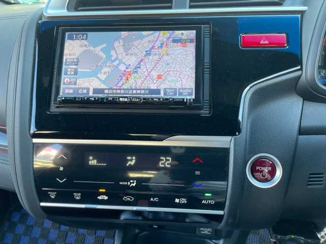 ホンダ フィット ハイブリット Sパッケージ 神奈川県 2015(平27)年 6.5万km ブリリアントスポーティブルーメタリック2トーン 社外SDナビ【NX614】		/・DTV/CD/DVD/ラジオ/SD/BT	/バックカメラ/ETC		/純正16インチAW/ルーフエンドスポイラー/クルーズコントロール/シティブレーキアクティブシステム/パドルシフト付き革巻きステアリング/D席シートリフター/スカッフイルミネーション/オートライト/純正LEDヘッドライト/フォグランプ/Egプッシュスタート/ ストップボタン		/スマートキー×2/ターンランプ付電動格納ドアミラー/純正フロアマット/取扱説明書/ナビ取扱説明書		/新車時保証書