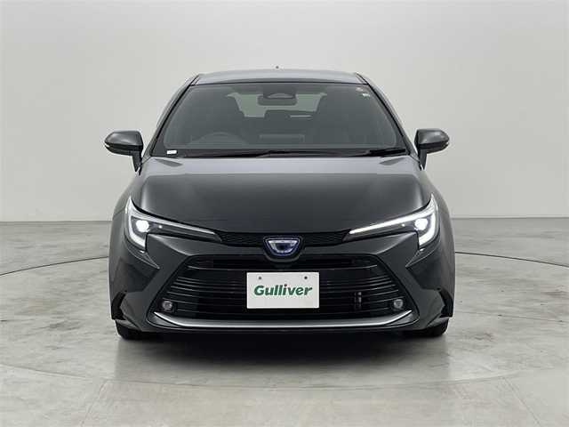 トヨタ カローラツーリング ハイブリッド ダブルバイビー 福岡県 2022(令4)年 1.5万km アティチュードブラックマイカ 純正ディスプレイオーディオ（ＢＴ，フルセグＴＶ）　/バックカメラ　/ビルトインＥＴＣ　/ＡＣＣ　/コーナーセンサー　/衝突軽減ブレーキ　/レーンキープ　/ＢＳＭ　/ＰＫＳＢ　/ＲＣＴＡ　/ハーフレザー　/純正１７インチＡＷ
