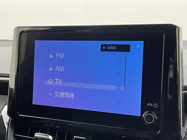トヨタ カローラツーリング ハイブリッド ダブルバイビー 福岡県 2022(令4)年 1.5万km アティチュードブラックマイカ 純正ディスプレイオーディオ（ＢＴ，フルセグＴＶ）　/バックカメラ　/ビルトインＥＴＣ　/ＡＣＣ　/コーナーセンサー　/衝突軽減ブレーキ　/レーンキープ　/ＢＳＭ　/ＰＫＳＢ　/ＲＣＴＡ　/ハーフレザー　/純正１７インチＡＷ