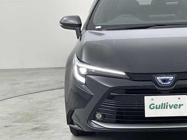 トヨタ カローラツーリング ハイブリッド ダブルバイビー 福岡県 2022(令4)年 1.5万km アティチュードブラックマイカ 純正ディスプレイオーディオ（ＢＴ，フルセグＴＶ）　/バックカメラ　/ビルトインＥＴＣ　/ＡＣＣ　/コーナーセンサー　/衝突軽減ブレーキ　/レーンキープ　/ＢＳＭ　/ＰＫＳＢ　/ＲＣＴＡ　/ハーフレザー　/純正１７インチＡＷ