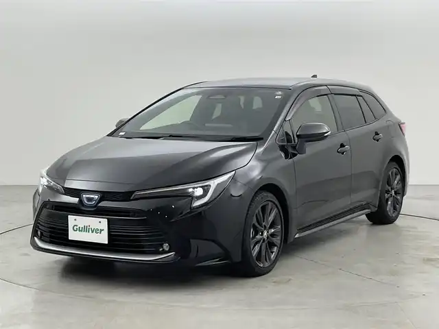 トヨタ カローラツーリング ハイブリッド ダブルバイビー 福岡県 2022(令4)年 1.5万km アティチュードブラックマイカ 純正ディスプレイオーディオ（ＢＴ，フルセグＴＶ）　/バックカメラ　/ビルトインＥＴＣ　/ＡＣＣ　/コーナーセンサー　/衝突軽減ブレーキ　/レーンキープ　/ＢＳＭ　/ＰＫＳＢ　/ＲＣＴＡ　/ハーフレザー　/純正１７インチＡＷ
