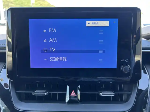 トヨタ カローラツーリング ハイブリッド ダブルバイビー 愛媛県 2022(令4)年 1.5万km アティチュードブラックマイカ 純正8インチディスプレイオーディオ/・Bluetooth/フルセグTV　/バックカメラ　/ビルトインETC/ハーフレザー/トヨタセーフティセンス/衝突軽減ブレーキ　/コーナーセンサー　/レーンキープ/オートライト/オートマチックハイビーム/BSM/PKSB　/RCTA/LEDヘッドライト　/純正17インチAW/スペアキー