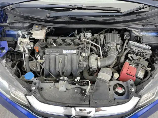 ホンダ フィット ハイブリット L ホンダセンシング 滋賀県 2017(平29)年 6.5万km 青 禁煙車/純正ナビ（VXM-185VFi）/CD/DVD/Bluetooth/HDMI/APPLE/バックカメラ/クルーズコントロール/LEDヘッドライト/純正１５AW/レーンキープアシスト/衝突軽減ブレーキ/横滑り防止装置/オートライト/カーテンエアバック/電動格納ミラー/スマートキー/ETC