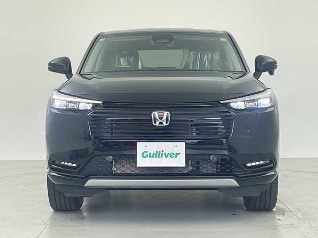ホンダ ヴェゼル ハイブリッド e:HEV Z 愛知県 2025(令7)年 0.1千km クリスタルブラックパール 登録済未使用車/純正ナビ/・フルセグ/・Bluetooth/アダプティブクルーズコントロール/シートヒーター/電動リアゲート/バックカメラ/衝突軽減ブレーキ/誤発進抑制（前方・後方）/ブラインドスポットモニター/クリアランスソナー/レーンキープアシスト/ワイヤレス充電/ビルドインETC2.0/パドルシフト/純正アルミホイール
