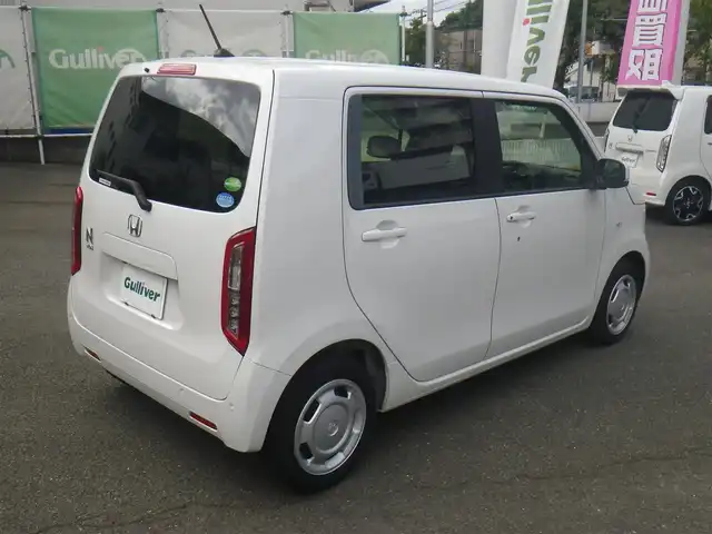 ホンダ Ｎ ＷＧＮ L ホンダセンシング 神奈川県 2020(令2)年 0.6万km プラチナホワイトパール ワンオーナー/登録時5964km/車検令和9年1月22日迄/点検記録（全てホンダディーラーで実施）/R3/1  R4/1  R4/12  R6/2  R7/1/純正メモリーナビ/（Bluetooth/USB/SD）/バックカメラ/パーキングセンサー/LEDヘッドランプ（オプション）/キーレス連動オート格納ミラー（オプション）/運転席シートヒーター/ドライブレコーダー（駐車監視モード付き）/ホンダセンシング/衝突軽減ブレーキ/誤発進抑制機能/歩行者事故低減ステアリング/先行車発進お知らせ機能/標識認識機能/路外逸脱抑制機能/渋滞追従機能付アダプティブクルーズコントロール/車線維持支援システム/オートハイビーム/後方誤発進抑制機能/スマートキーx2/23年製ブリジストン4本装着/取説書/保証書