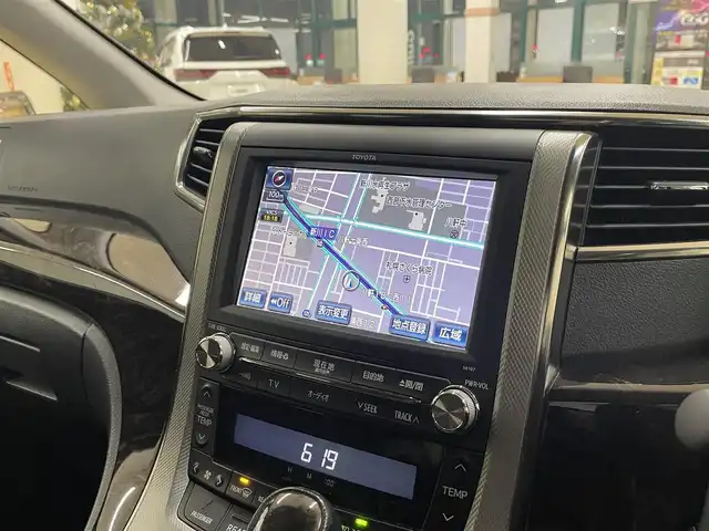 トヨタ ヴェルファイア ハイブリット ZR Gエディション 道央・札幌 2012(平24)年 4万km ブラック ・4WD/・寒冷地仕様/・純正ナビ/フルセグTV/DVD/CD/MSV/BT/・パノラミックビューモニター/・リヤフリップダウンモニター/・プレミアムサウンドシステム/・サンルーフ/・パワーバックドア/・クルーズコントロール/・両側パワースライドドア/・AC100V100W電源/・パーキングセンサー/・AFS/・ワイパーデアイサー/・ビルトインETC/・レザーシート/・前席パワーシート/・前席シートヒーター/・モデリスタマフラー/・HID/・フロントフォグ/・プッシュスタート/・スマートキー/・ドアバイザー/・電格ミラー