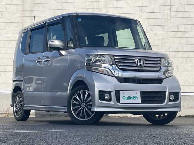 ホンダ Ｎ ＢＯＸ カスタム G ターボ Aパッケージ 山形県 2014(平26)年 7.1万km カトラリーシルバーM ４WD・ターボエンジン/純正SDナビ/AM/FM/ワンセグTV/CD/DVD/Bluetooth接続/ETC/バックカメラ/両側パワースライドドア/衝突軽減ブレーキ/横滑り防止装置/クルーズコントロール/パドルシフト/アイドリングストップ/LEDヘッドライト/社外15インチアルミホイール/純正ドアバイザー