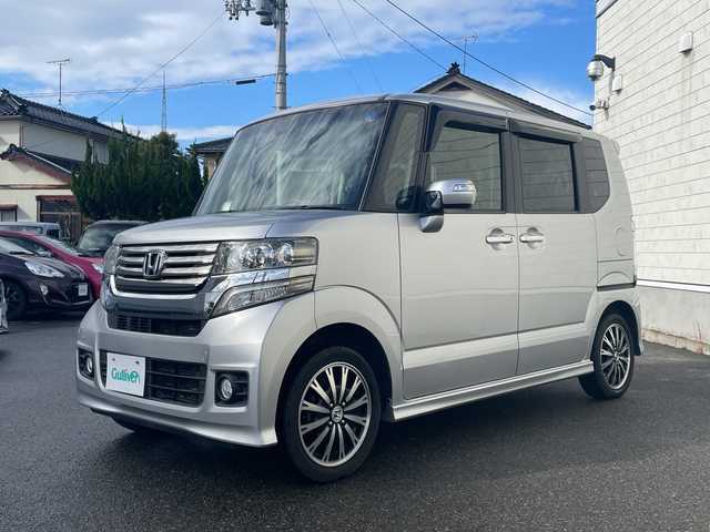ホンダ Ｎ ＢＯＸ カスタム G ターボ Aパッケージ 山形県 2014(平26)年 7.1万km カトラリーシルバーM ４WD・ターボエンジン/純正SDナビ/AM/FM/ワンセグTV/CD/DVD/Bluetooth接続/ETC/バックカメラ/両側パワースライドドア/衝突軽減ブレーキ/横滑り防止装置/クルーズコントロール/パドルシフト/アイドリングストップ/LEDヘッドライト/社外15インチアルミホイール/純正ドアバイザー