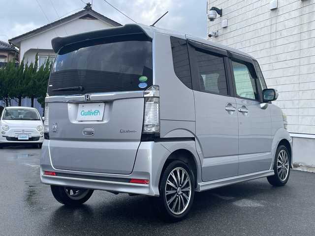 ホンダ Ｎ ＢＯＸ カスタム G ターボ Aパッケージ 山形県 2014(平26)年 7.1万km カトラリーシルバーM ４WD・ターボエンジン/純正SDナビ/AM/FM/ワンセグTV/CD/DVD/Bluetooth接続/ETC/バックカメラ/両側パワースライドドア/衝突軽減ブレーキ/横滑り防止装置/クルーズコントロール/パドルシフト/アイドリングストップ/LEDヘッドライト/社外15インチアルミホイール/純正ドアバイザー