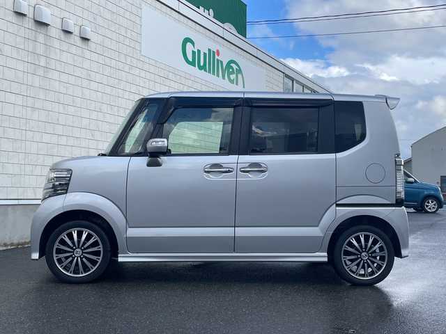 ホンダ Ｎ ＢＯＸ カスタム G ターボ Aパッケージ 山形県 2014(平26)年 7.1万km カトラリーシルバーM ４WD・ターボエンジン/純正SDナビ/AM/FM/ワンセグTV/CD/DVD/Bluetooth接続/ETC/バックカメラ/両側パワースライドドア/衝突軽減ブレーキ/横滑り防止装置/クルーズコントロール/パドルシフト/アイドリングストップ/LEDヘッドライト/社外15インチアルミホイール/純正ドアバイザー