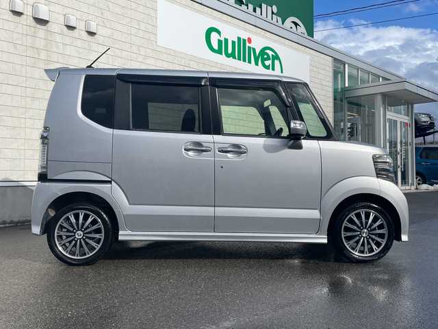 ホンダ Ｎ ＢＯＸ カスタム G ターボ Aパッケージ 山形県 2014(平26)年 7.1万km カトラリーシルバーM ４WD・ターボエンジン/純正SDナビ/AM/FM/ワンセグTV/CD/DVD/Bluetooth接続/ETC/バックカメラ/両側パワースライドドア/衝突軽減ブレーキ/横滑り防止装置/クルーズコントロール/パドルシフト/アイドリングストップ/LEDヘッドライト/社外15インチアルミホイール/純正ドアバイザー