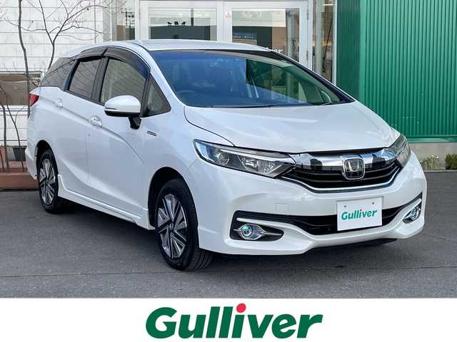 ホンダ シャトル ハイブリッド ホンダセンシング 青森県 2018(平30)年 11.3万km プラチナホワイトパール 4WD/社外SDナビ・フルセグTV/CD・DVD・Bluetooth・USB・SD/バックカメラ/ホンダセンシング/衝突軽減ブレーキ/追従クルーズコントロール/レーンキープアシスト/前方ドライブレコーダー/ワイパーデアイサー/ビルトインETC/プッシュスタート/スマートキー/LEDフォグランプ