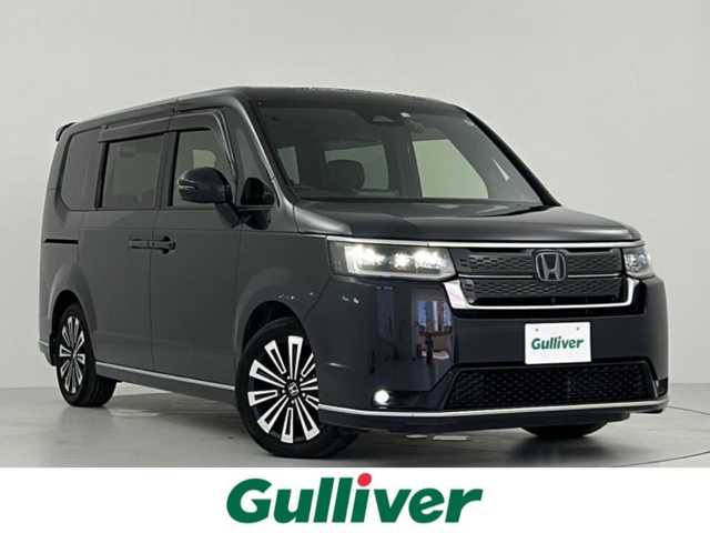 ホンダ ステップワゴン スパーダ eHEV プレミアムライン 大阪府 2022(令4)年 4.4万km トワイライトミストブラックパール HONDA SENSING/　・路外逸脱抑制機能/　・ブラインドスポットインフォメーション/　・踏み間違い衝突軽減システム/　・パーキングセンサー警報/　・衝突軽減ブレーキ/　・レーンキープアシストシステム/　・標識認識機能/純正15.6型フリップダウンモニター　/純正11.4型ナビ/（CD/DVD/SD/Bluetooth/USB/HDMI/フルセグTV）/マルチビューモニター/両側電動スライドドア/アダプティブクルーズコントロール/パワーバックドア/LEDヘッドライト/フォグランプ/オートヘッドライト/ステアリングリモコン/パドルシフト/ハーフレザーシート/シートヒーター/純正アルミホイール/純正フロアマット/USB充電/オートリトラーミラー/リアロールサンシェイド/電動パーキングブレーキ/オートホールドブレーキ