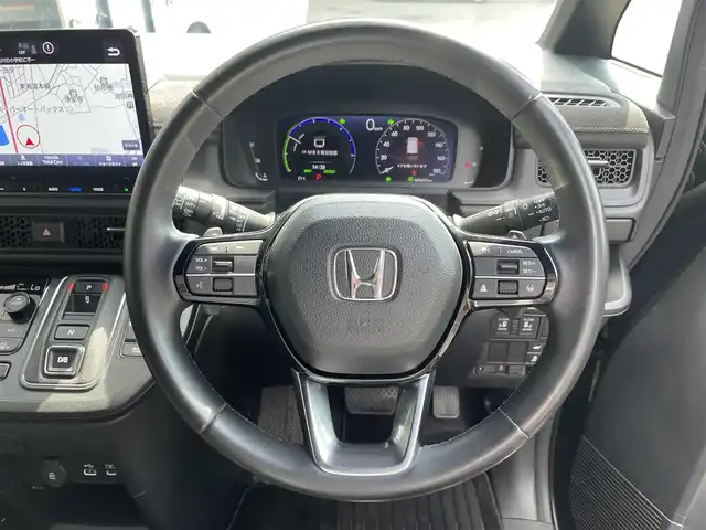 ホンダ ステップワゴン スパーダ eHEV プレミアムライン 滋賀県 2022(令4)年 4.4万km トワイライトミストブラックパール 純正11.4型ナビ/（CD/DVD/SD/Bluetooth/USB/HDMI/フルセグTV）/マルチビューモニター/純正15.6型フリップダウンモニター/前後ドライブレコーダー/ビルトインETC/両側電動スライドドア/パワーバックドア/電動パーキングブレーキ/オートホールドブレーキ/路外逸脱抑制機能/ブラインドスポットインフォメーション/踏み間違い衝突軽減システム/パーキングセンサー警報/衝突軽減ブレーキ/レーンキープアシストシステム/標識認識機能/革巻きステアリング/アダプティブクルーズコントロール/ステアリングリモコン/パドルシフト/ハーフレザーシート/シートヒーター/LEDヘッドライト/フォグランプ/オートヘッドライト/純正アルミホイール/純正フロアマット/USB充電/オートリトラーミラー/カーテンエアバッグ/リアロールサンシェイド