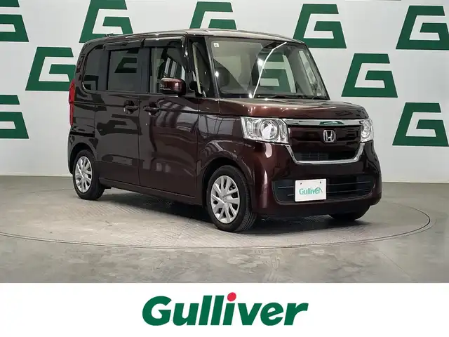 ホンダ Ｎ ＢＯＸ G ホンダセンシング 鹿児島県 2019(令1)年 2.8万km プレミアムアガットブラウンP ワンオーナー/禁煙車/バックカメラ/ビルトインETC/前方ドラレコ/KENWOODナビ/（ワンセグ/CD・DVD/AM・FM/iPod/AUX）/ホンダセンシング/・衝突被害軽減ブレーキ/・前後誤発進抑制機能/・路外逸脱抑制機能/・先行車発進お知らせ機能/・標識認識機能/・アダクティブクルーズコントロール/・レーンキープアシストシステム/・オートハイビーム/社外フロアマット/純正ドアバイザー/オートライト/ステアリングリモコン/ECON/電格ミラー/プッシュスタート/スマートキー/スペアキー