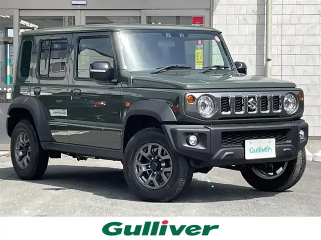 スズキ ジムニー ノマド FC 岩手県 2025(令7)年 0.1万km未満 ジャングルグリーン ・ワンオーナー/・4WD/・デュアルカメラブレーキサポート/・アダプティブクルーズコントロール/・車線逸脱警報/・パーキングセンサー/・アイドリングストップ/・前席シートヒーター/・横滑り防止/・LEDヘッドライト/・フロントフォグ/・リヤフォグ/・プッシュスタート/・スマートキー