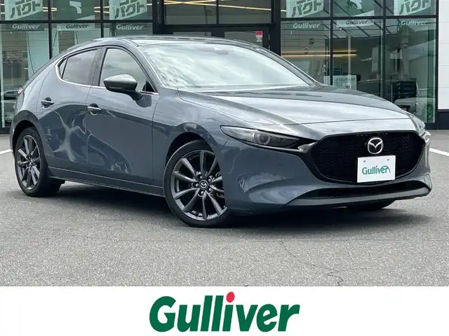 マツダ マツダ３ファストバック XD バーガンディセレクション 岡山県 2020(令2)年 9.9万km ポリメタルグレーM 純正ナビ　/ＢＳＭ　/ＳＢＳ　/バックカメラ　/シートヒーター　/衝突被害軽減システム　/横滑り防止装置　/カーテンエアバック　/オートライト　/パワーシート　/ＥＴＣ　/ＵＳＢ入力端子　/Ｂｌｕｅｔｏｏｔｈ　/ＬＥＤライト