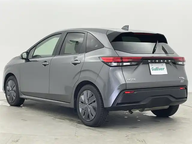 日産 ノート X FOUR 富山県 2022(令4)年 3.7万km ダークメタルグレー 4WD/純正メーカーナビ9インチ（AM/FM/BT/USB）/フルセグテレビ/プロパイロット（衝突軽減システム）/アラウンドビューカメラ（全方位）/バックカメラ/置くだけ充電/D席、N席シートヒーター/ハンドルヒーター/デジタルインナーミラー/クルーズコントロール/ハンドル支援装置/ビルトインETC/オートライト/横滑り防止措置/純正フロアマット