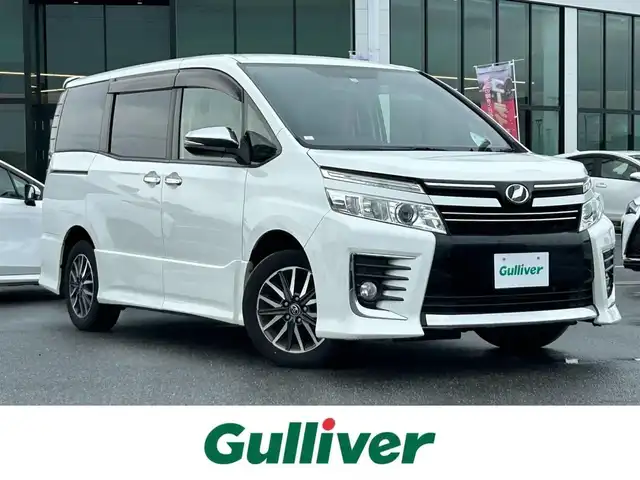 トヨタ ヴォクシー ZS 煌 奈良県 2015(平27)年 6.2万km ホワイトパールクリスタルシャイン ALPINEナビ /フルセグTV /両側パワースライドドア /バックカメラ /スマートキー /純正フロアマット /純正アルミホイール /リアサーキュレータ- /LEDヘッドライト /オートライト /盗難防止装置 /ETC
