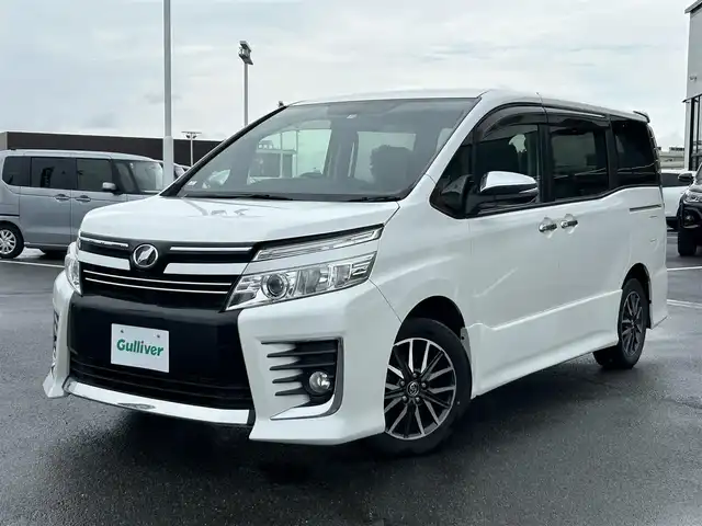 トヨタ ヴォクシー ZS 煌 奈良県 2015(平27)年 6.2万km ホワイトパールクリスタルシャイン ALPINEナビ /フルセグTV /両側パワースライドドア /バックカメラ /スマートキー /純正フロアマット /純正アルミホイール /リアサーキュレータ- /LEDヘッドライト /オートライト /盗難防止装置 /ETC