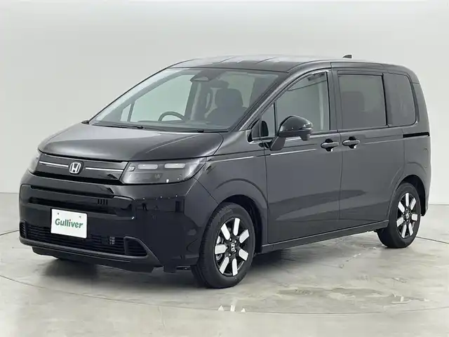 ホンダ フリード ハイブリット e:HEV AIR EX 福岡県 2025(令7)年 0.1千km クリスタルブラックパール 登録済未使用車　/純正９型ナビ（フルセグＴＶ）　/バックカメラ　/アダプティブクルコン　/コーナーセンサー　/衝突軽減ブレーキ　/レーンキープ　/ＢＳＭ　/アクセル踏み間違い防止　/両側電動スライドドア　/シートヒーター