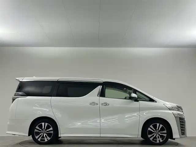 トヨタ ヴェルファイア Z Gエディション 埼玉県 2019(平31)年 4.8万km ホワイトパールクリスタルシャイン 禁煙 後席モニタ 純正10型ナビ 両側電動 Bカメラ 温冷シート LEDヘッドライト ビルトインETC 前後ドライブレコーダー フルセグ BT パワーシート 電動リアゲート 追従走行 ワイヤレス充電　ＭＴモード付ＡＴ　オートハイビーム　レーンキープ　コーナーセンサー　純正フロアマット　フルフラット　オットマン　衝突被害軽減　スマートキー　プッシュスタート　１００Ｖ電源