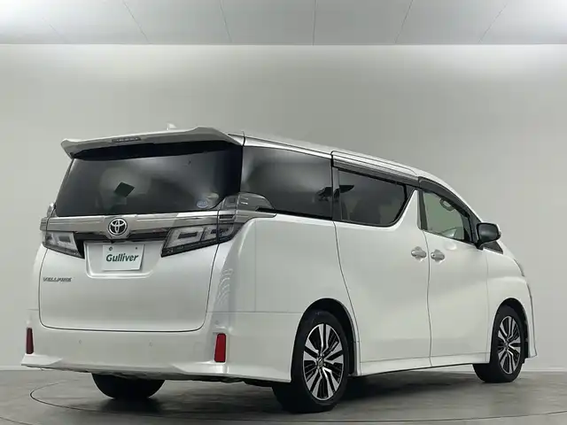 トヨタ ヴェルファイア Z Gエディション 埼玉県 2019(平31)年 4.8万km ホワイトパールクリスタルシャイン 禁煙 後席モニタ 純正10型ナビ 両側電動 Bカメラ 温冷シート LEDヘッドライト ビルトインETC 前後ドライブレコーダー フルセグ BT パワーシート 電動リアゲート 追従走行 ワイヤレス充電　ＭＴモード付ＡＴ　オートハイビーム　レーンキープ　コーナーセンサー　純正フロアマット　フルフラット　オットマン　衝突被害軽減　スマートキー　プッシュスタート　１００Ｖ電源