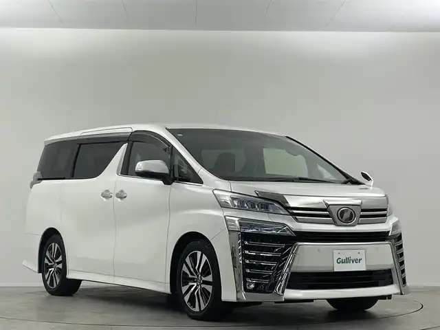 トヨタ ヴェルファイア Z Gエディション 埼玉県 2019(平31)年 4.8万km ホワイトパールクリスタルシャイン 禁煙 後席モニタ 純正10型ナビ 両側電動 Bカメラ 温冷シート LEDヘッドライト ビルトインETC 前後ドライブレコーダー フルセグ BT パワーシート 電動リアゲート 追従走行 ワイヤレス充電　ＭＴモード付ＡＴ　オートハイビーム　レーンキープ　コーナーセンサー　純正フロアマット　フルフラット　オットマン　衝突被害軽減　スマートキー　プッシュスタート　１００Ｖ電源