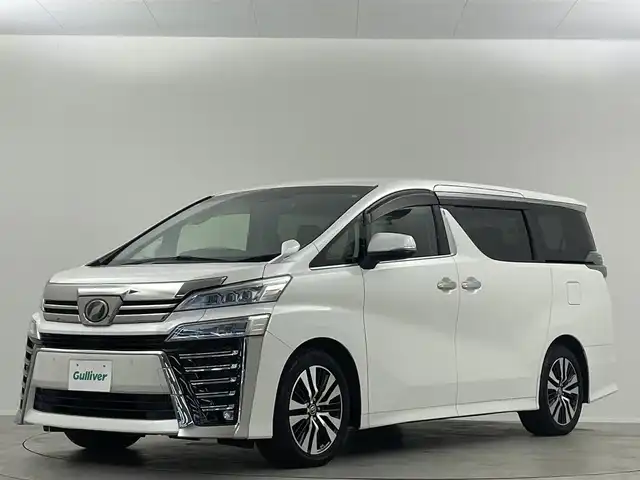 トヨタ ヴェルファイア Z Gエディション 埼玉県 2019(平31)年 4.8万km ホワイトパールクリスタルシャイン 禁煙 後席モニタ 純正10型ナビ 両側電動 Bカメラ 温冷シート LEDヘッドライト ビルトインETC 前後ドライブレコーダー フルセグ BT パワーシート 電動リアゲート 追従走行 ワイヤレス充電　ＭＴモード付ＡＴ　オートハイビーム　レーンキープ　コーナーセンサー　純正フロアマット　フルフラット　オットマン　衝突被害軽減　スマートキー　プッシュスタート　１００Ｖ電源