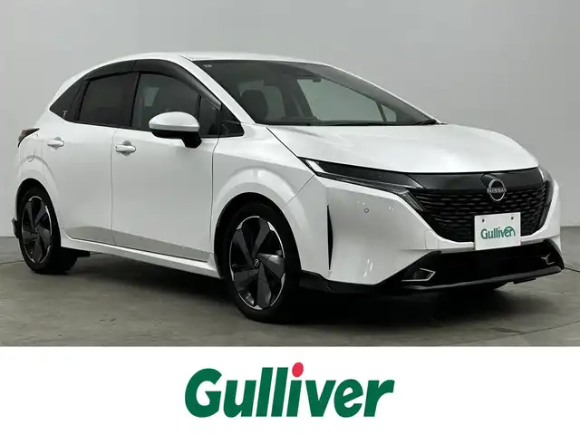 日産 オーラ G レザーエディション 大分県 2022(令4)年 1.6万km ピュアホワイトパール 純正SDナビ/　BT/CD/DVD/フルセグ/全方位カメラ/アラウンドビューモニター/プロパイロット/オートブレーキホールド/コーナーセンサー/オートマチックハイビーム/ビルトインETC/LEDヘッドライト/レザーシート/ドライブレコーダー/純正アルミホイル17インチ/純正フロアマット/革巻ステアリング