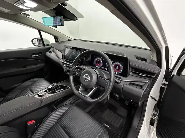 日産 オーラ G レザーエディション 大分県 2022(令4)年 1.6万km ピュアホワイトパール 純正SDナビ/　BT/CD/DVD/フルセグ/全方位カメラ/アラウンドビューモニター/プロパイロット/オートブレーキホールド/コーナーセンサー/オートマチックハイビーム/ビルトインETC/LEDヘッドライト/レザーシート/ドライブレコーダー/純正アルミホイル17インチ/純正フロアマット/革巻ステアリング