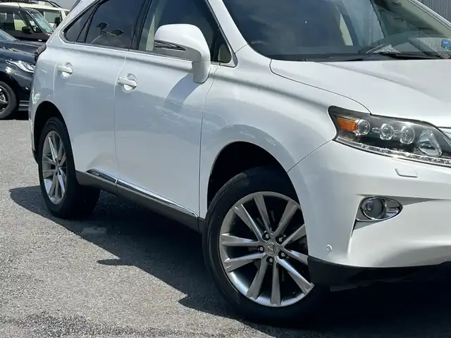 レクサス ＲＸ 450h バージョンL エアサス 静岡県 2013(平25)年 6.5万km ホワイトパールクリスタルシャイン ユーザー買取車両/純正MOPナビ/　【CD/DVD/BT/地デジフルセグTV】/3眼LEDヘッドライト/純正19インチAW/社外テールランプ（純正テールランプ積込）/エアーサスペンション/ベージュレザーシート/シートヒーター/ベンチレーション/ステアリングヒーター/バックカメラ/ウッドコンビステアリング/パワーバックドア/パワーシート/ビルトインETC2.0/新車時保証書/取扱説明書