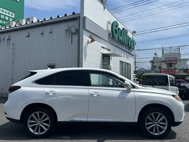 レクサス ＲＸ 450h バージョンL エアサス 静岡県 2013(平25)年 6.5万km ホワイトパールクリスタルシャイン ユーザー買取車両/純正MOPナビ/　【CD/DVD/BT/地デジフルセグTV】/3眼LEDヘッドライト/純正19インチAW/社外テールランプ（純正テールランプ積込）/エアーサスペンション/ベージュレザーシート/シートヒーター/ベンチレーション/ステアリングヒーター/バックカメラ/ウッドコンビステアリング/パワーバックドア/パワーシート/ビルトインETC2.0/新車時保証書/取扱説明書