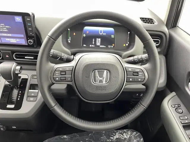 ホンダ フリード ハイブリット e:HEV クロスター 熊本県 2025(令7)年 0.1千km クリスタルブラックパール 登録済未使用車/純正9インチナビLXM-242ZFNI（ＡｐｐｌＣａｒＰｌａｙ・ＡｎｄｒｏｉｄＡｕｔｏ・ＢＴ・フルセグ）/バックカメラ　/両側パワースライドドア　/前後クリアランスソナー　/ホンダセンシング/・衝突軽減ブレーキ/・歩行者事故低減ステアリング/・路外逸脱制御機能/・アダブティブクルーズコントロール/・車線維持支援システム/・先行車発進お知らせ機能/・標識認識機能/・オートマチックハイビーム/・ブラインドスポットモニター/横滑り防止/前席シートヒーター/オートブレーキホールド/ハーフレザーシート/純正１５インチAW/ルーフレール/オートライト/LEDヘッドライト/フォグライト/スマートキー/プッシュスタート/スペアキー1本/保証書/取扱説明書
