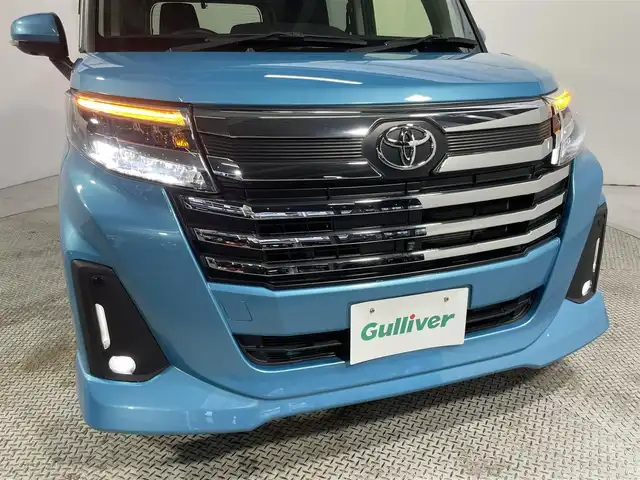 トヨタ ルーミー カスタムG 大阪府 2023(令5)年 1.3万km ターコイズブルーマイカメタリック 純正9incナビ(フルセグ/DVD再生/Bluetooth) 360カメラ 後席モニター ETC 両側パワースライドドア シートヒーター 衝突軽減 レーダークルコン クリアランスソナー ドラレコ