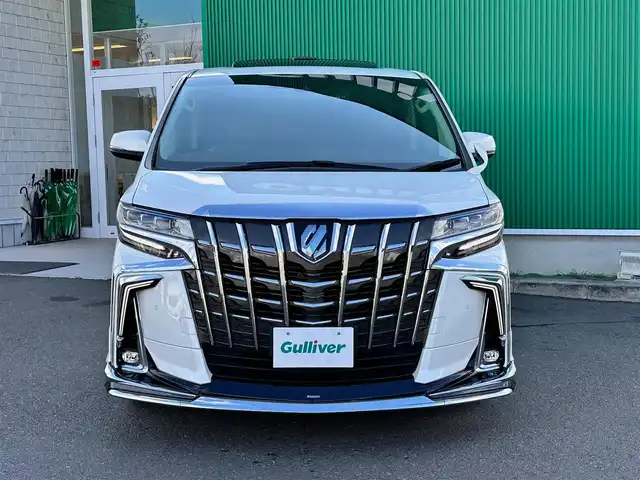トヨタ アルファード S Cパッケージ 宮城県 2022(令4)年 5.2万km ホワイトパールクリスタルシャイン ツインムーンルーフ/＝＝＝/モデリスタフロントスポイラー/セーフティセンス/・プリクラッシュセーフティ/・レーントレーシングアシスト/・アダプティブハイビームシステム/・ロードサインアシスト/・レーダークルーズコントロール（全車速追従機能付）/パーキングサポートブレーキ（前後方静止物）/純正12インチフリップダウンモニター/9インチディスプレイオーディオ/・ナビ付/・CD/DVDデッキ/・Bluetooth/・フルセグTV/・AppleCarPlay/AndroidAuto/バックカメラ/ビルトインETC2.0/ドライブレコーダー/AC100V/100Wアクセサリーコンセント/パワーバックドア/両側パワースライドドア/ブラック合皮シート/パワーシート（運転席メモリー機能付）/シートヒーター/ベンチレーション/ステアヒーター/ウッドコンビステアリング/電動パーキングブレーキ/ブレーキホールド/3眼LEDヘッドランプ/フォグランプ/オートライト/スマートキー2本/純正18インチAW/純正フロアマット/W/サイド/カーテンエアバッグ