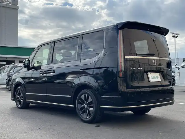 ホンダ ステップワゴン スパーダ 東京都 2023(令5)年 4.7万km クリスタルブラックパール 純正１１型ナビ　/両側電動スライドドア　/レーダークルーズコントロール　/電動リアゲート　/ＢＳＭ　/シートヒーター　/オットマン　/ＥＴＣ　/フルセグＴＶ　/純正フロアマット　/純正ＬＥＤ　/純正アルミホイール　/ＡＢＳ/横滑り防止装置/コーナーセンサー/レーンアシスト/盗難防止装置/衝突被害軽減ブレーキ
