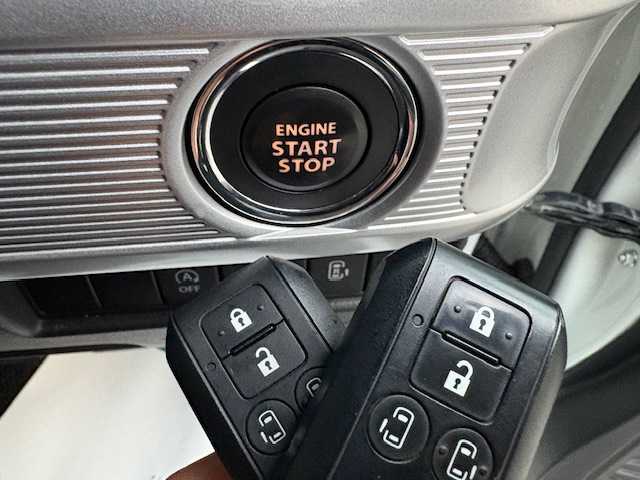 スズキ スペーシア カスタム HYBRID XS 大阪府 2020(令2)年 2.3万km ピュアホワイトP 純正ナビ/全方位カメラ/ヘッドアップディスプレイ/両側パワースライドドア/スズキセーフティサポート/シートヒーター/ハーフレザーシート/LEDヘッドライト/純正アルミホイール/ビルトインETC/プッシュスタート/スマートキー×2