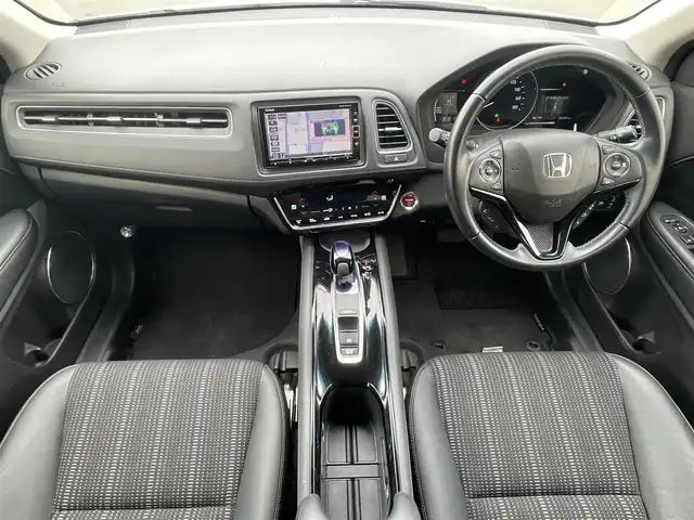 ホンダ ヴェゼル ハイブリッド Z ホンダセンシング 東京都 2018(平30)年 7.3万km ホワイトオーキッドパール ホンダセンシング　/・衝突軽減ブレーキ　/・誤発進抑制機能　/・ＡＣＣ　/・ＬＫＡＳ　/・先行車発進　/運転席助手席シートヒーター　/ハーフレザーシート　/ワンオーナー　/ＥＴＣ　/バックカメラ　/コンフォートビューパッケージ