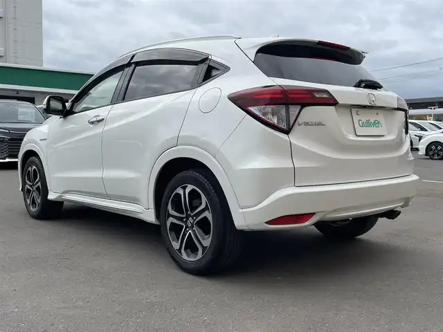 ホンダ ヴェゼル ハイブリッド Z ホンダセンシング 東京都 2018(平30)年 7.3万km ホワイトオーキッドパール ホンダセンシング　/・衝突軽減ブレーキ　/・誤発進抑制機能　/・ＡＣＣ　/・ＬＫＡＳ　/・先行車発進　/運転席助手席シートヒーター　/ハーフレザーシート　/ワンオーナー　/ＥＴＣ　/バックカメラ　/コンフォートビューパッケージ