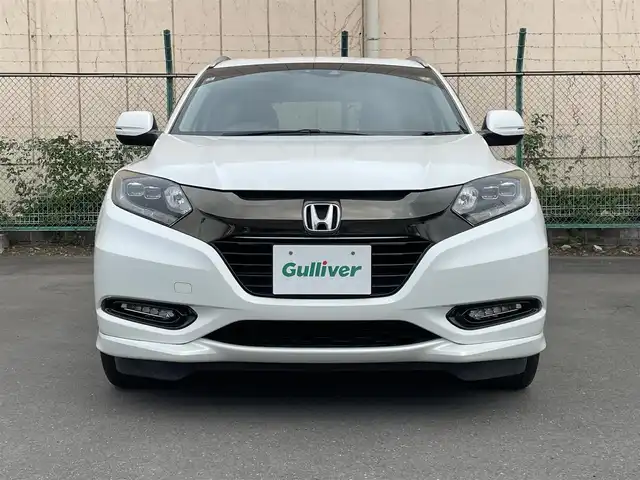 ホンダ ヴェゼル ハイブリッド Z ホンダセンシング 東京都 2018(平30)年 7.3万km ホワイトオーキッドパール ホンダセンシング　/・衝突軽減ブレーキ　/・誤発進抑制機能　/・ＡＣＣ　/・ＬＫＡＳ　/・先行車発進　/運転席助手席シートヒーター　/ハーフレザーシート　/ワンオーナー　/ＥＴＣ　/バックカメラ　/コンフォートビューパッケージ