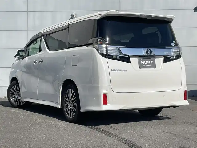 トヨタ ヴェルファイア Z Gエディション 千葉県 2016(平28)年 11.1万km ホワイトパールクリスタルシャイン ユーザー買取車両/純正フリップダウンモニター/純正9インチナビ/・フルセグ/BT/DVD/CD/バックカメラ/ステアリングスイッチ/MTモード/クルーズコントロール/両側パワースライドドア/ハーフレザーシート/パワーシート(D/N席)/D席3メモリシート/ステアリングヒーター/LEDヘッドライト/オートライト/フォグライト/スマートキー/プッシュスタート/純正フロアマット/純正18インチAW