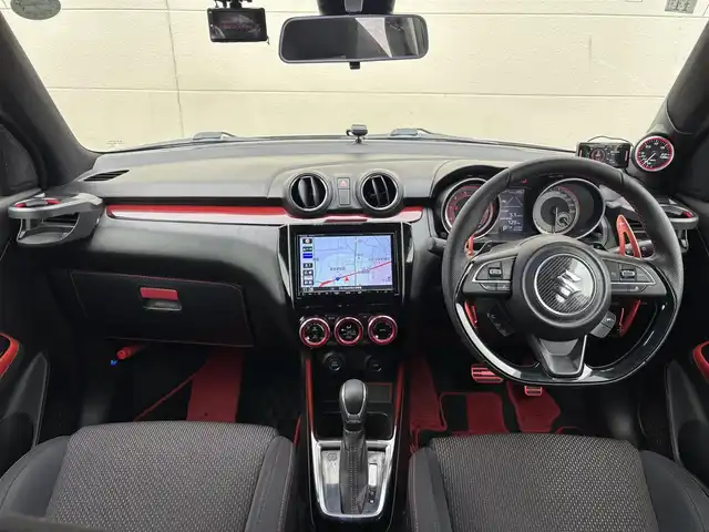 スズキ スイフト スポーツ 茨城県 2019(令1)年 7万km ピュアホワイトP 純正ナビ/(CD/DVD/TV/Bluetooth)/SilkBlazeスポイラー/サブウーファー（ts-wx610a）/スロットルコントローラー（pivot 3-drive pro）/ターボ計（DF19502)/レーダー探知機（AR-W55GA）/社外マフラー（ROSSO MODELLO）/室内LEDライト/xiangshangボンネットダンパー/パドルシフト/全方位カメラ/レーダークルーズコントロール/前後ドライブレコーダー/シートヒーター/レーンキープアシスト/スペアキー/衝突被害軽減ブレーキ/純正17インチアルミホイール