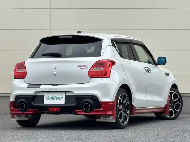 スズキ スイフト スポーツ 茨城県 2019(令1)年 7万km ピュアホワイトP 純正ナビ/(CD/DVD/TV/Bluetooth)/SilkBlazeスポイラー/サブウーファー（ts-wx610a）/スロットルコントローラー（pivot 3-drive pro）/ターボ計（DF19502)/レーダー探知機（AR-W55GA）/社外マフラー（ROSSO MODELLO）/室内LEDライト/xiangshangボンネットダンパー/パドルシフト/全方位カメラ/レーダークルーズコントロール/前後ドライブレコーダー/シートヒーター/レーンキープアシスト/スペアキー/衝突被害軽減ブレーキ/純正17インチアルミホイール