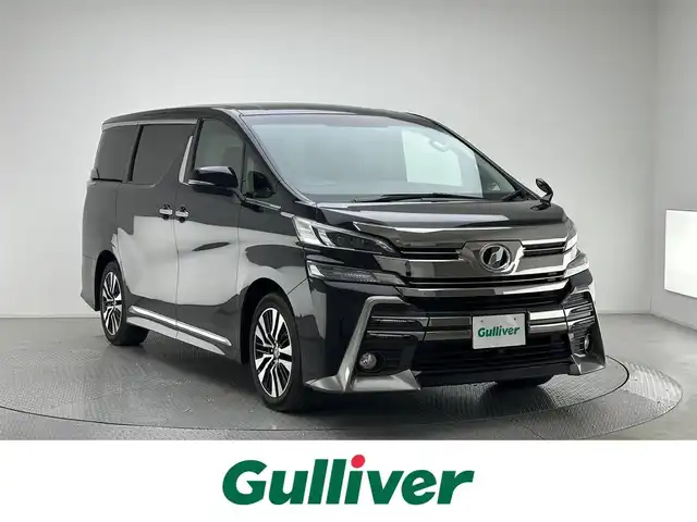 トヨタ ヴェルファイア Z Aエディション 兵庫県 2015(平27)年 5.5万km バーニングブラッククリスタルシャインガラスフレーク 純正9インチSDナビ/(NSZT-Y64T)/フルセグ CD DVD BT MSV/バックカメラ/ビルトインETC/純正ドライブレコーダー/両側パワースライドドア/コーナーセンサー/クルーズコントロール/LEDヘッドライト/LEDフォグライト/オートライト/オートハイビーム/純正18インチアルミホイール/純正マット/スマートキー/スペアキー