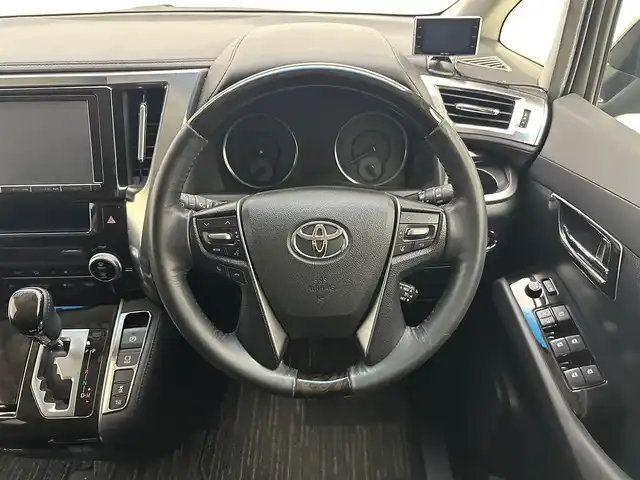 トヨタ ヴェルファイア Z Aエディション 兵庫県 2015(平27)年 5.5万km バーニングブラッククリスタルシャインガラスフレーク 純正9インチSDナビ/(NSZT-Y64T)/フルセグ CD DVD BT MSV/バックカメラ/ビルトインETC/純正ドライブレコーダー/両側パワースライドドア/コーナーセンサー/クルーズコントロール/LEDヘッドライト/LEDフォグライト/オートライト/オートハイビーム/純正18インチアルミホイール/純正マット/スマートキー/スペアキー